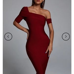 A beautiful bandage dress. Rich Burgundy/ Wine color great for the Holidays!